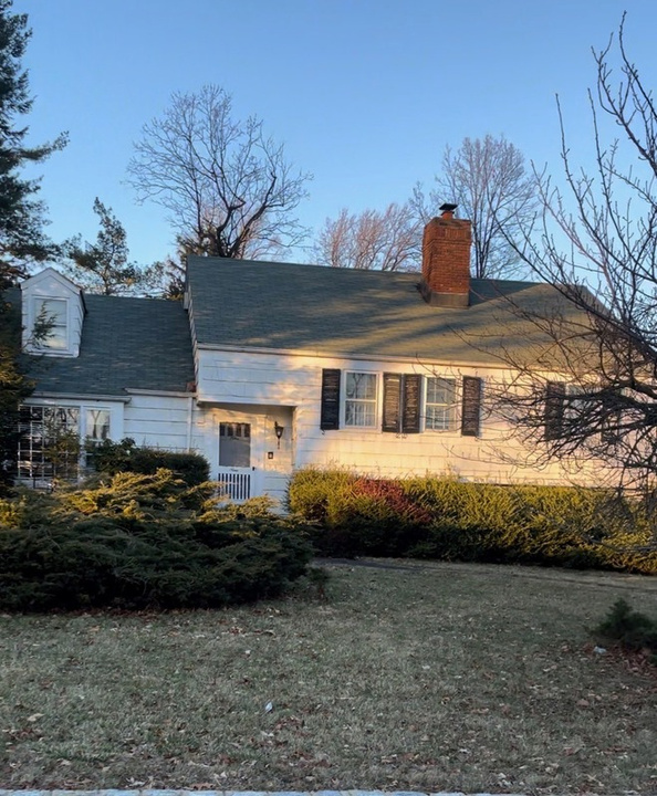 Rear exterior before renovation at 9 Cornell Way